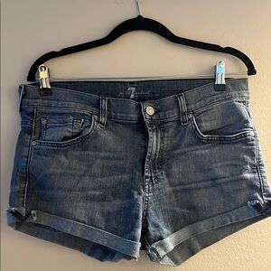 Blue Jean Shorts with Cuffed Hem and Distressed Look